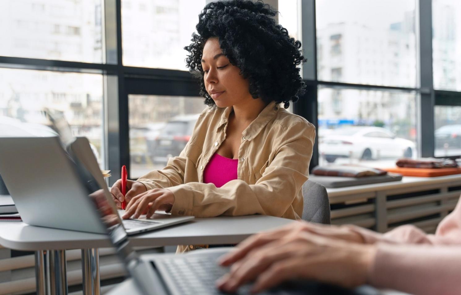 Workshop participants engaged in hands-on investment analysis session